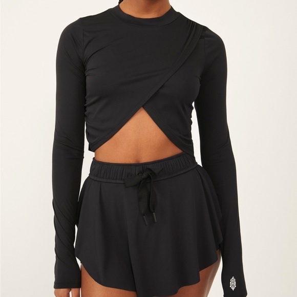 Free People Tops - NWOT With A Twist layer top by FP Movement from Free People in size large